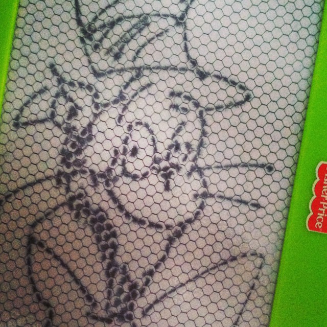 Scribbling on the little guy's Magna-doodle